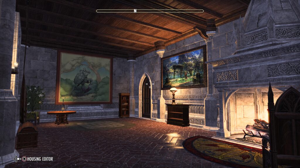 Photo of Grand Psijic Villa - Inner Study. There is a fire place with a fire burning. A painting of a knight and a painting of a scenic arch.