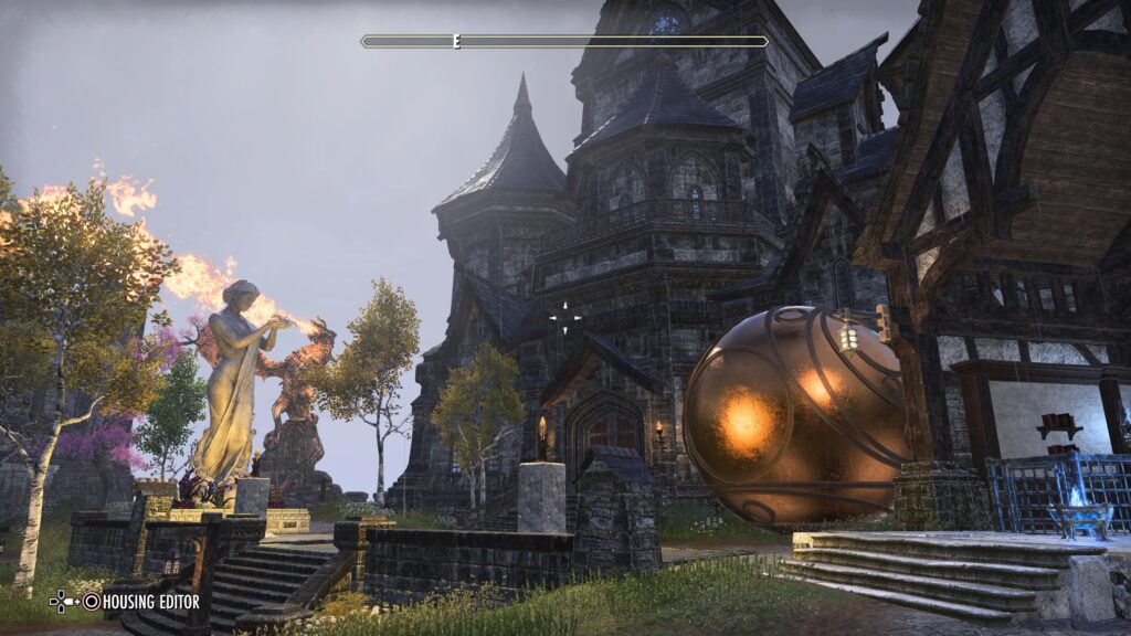 Exterior view of the Daggerfall Estate. It has high turrets and a golden sphere sits in the foreground. A dragon statue roars flames in the background.