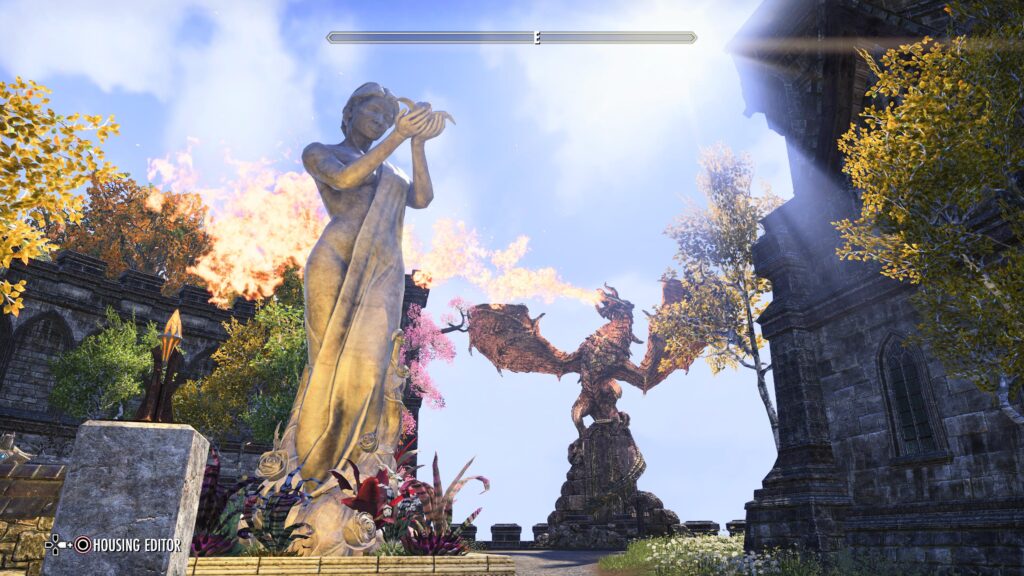 Picture of the outside of the Daggerfall Estate in ESO. There is a giant statue of Dibella with her base covered in beautiful flowers. In the background a statue of a dragon is breathing out orange fire.