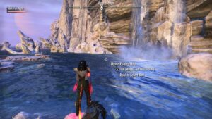 Southern Artaeum shore by a waterfall with a black Khajiiti standing by a fishing spot.